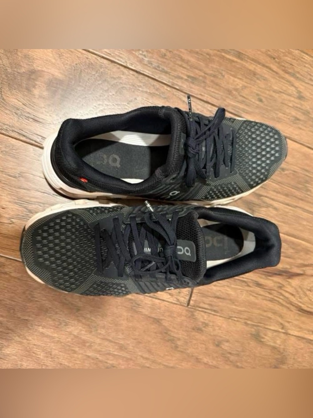 On Running Women’s Black and White Sneakers